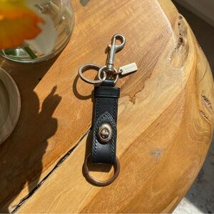 Coach black/gold leather valet keychain